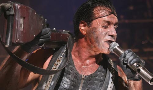 Till Lindemann with weapon and mic